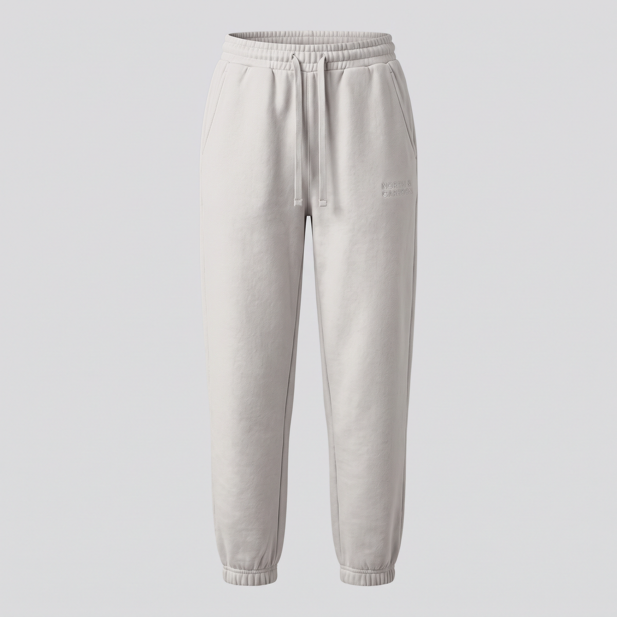 Jogging fuselé, gris perle, vue de face — NORTH & CARTOON